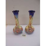 A pair of Old Tupton Ware hand painted vases, 20 cm tall.