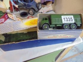 A boxed Dinky 660 tank transporter and a 622 10 ton army truck.