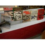 Seven hard back books relating to fire arms etc.,