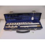 A cased silver plate flute by Gemeinhardt Elkhart Ltd, M2, C36948.