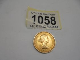 A 1959 gold sovereign,