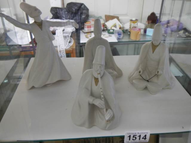 Four 'Whirling Dirvish' figures.