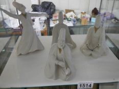 Four 'Whirling Dirvish' figures.