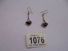 A pair of 9ct gold pendant earrings, 7.6 grams.