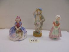 Two small Royal Doulton figures and one other.
