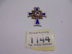 A WW2 German Third Class Mother's cross.