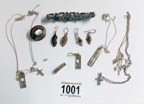 A mixed lot of silver jewellery including pendants, earrings, bracelet etc., approximately 66 grams.