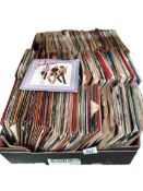 A box of 45 RPM records including Shalamar, Rolling Stones & Bros etc