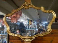 A nice shaped gilt framed mirror, COLLECT ONLY.