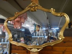 A nice shaped gilt framed mirror, COLLECT ONLY.