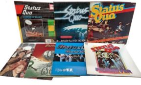 7 Status Quo records. Vinyl mixed condition, Covers used