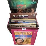 A case of LPs including Elvis, Buddy Holly etc