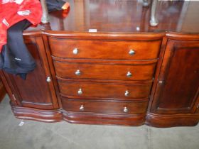 A good quality four drawer two door mahogany sideboard. COLLECT ONLY,