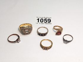 Six assorted dress rings.