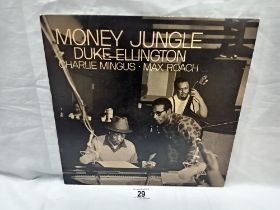 Duke Ellington, Charlie Mingus & Max Roach Money Jungle Re-Issue LP. Vinyl Nr Mint Cover Nr Mint