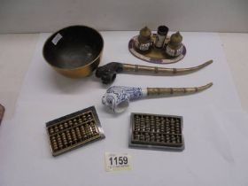 A mixed lot of oriental items including monkey pipe, cloissonne condiment set, small abacus etc.,