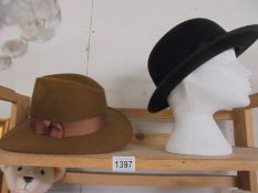 A Woodrow Picadilly bowler hat and another hat.
