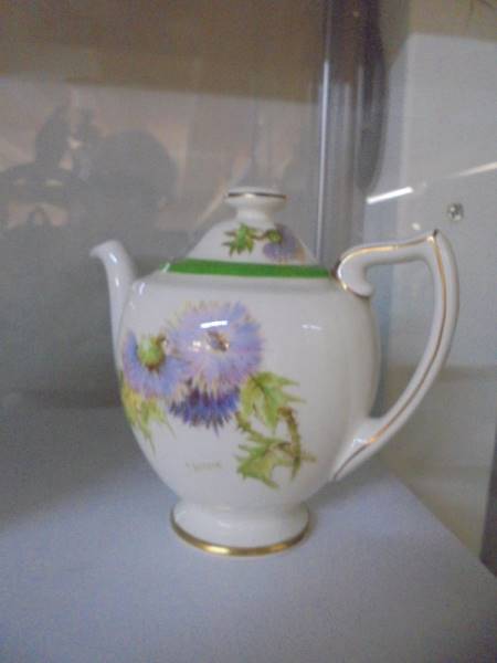 A Royal Doulton Glamis Thistle teapot and a Goode & Co., London teapot. - Image 2 of 5