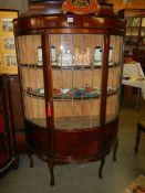 A good early 20th century tall display cabinet in good condition, COLLECT ONLY.
