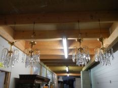 A set of four matching chandeliers. COLLECT ONLY.