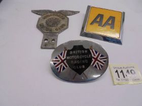 A Stretford Motor Club car badge, A British Motorcycle Racing club car badge and an AA badge.