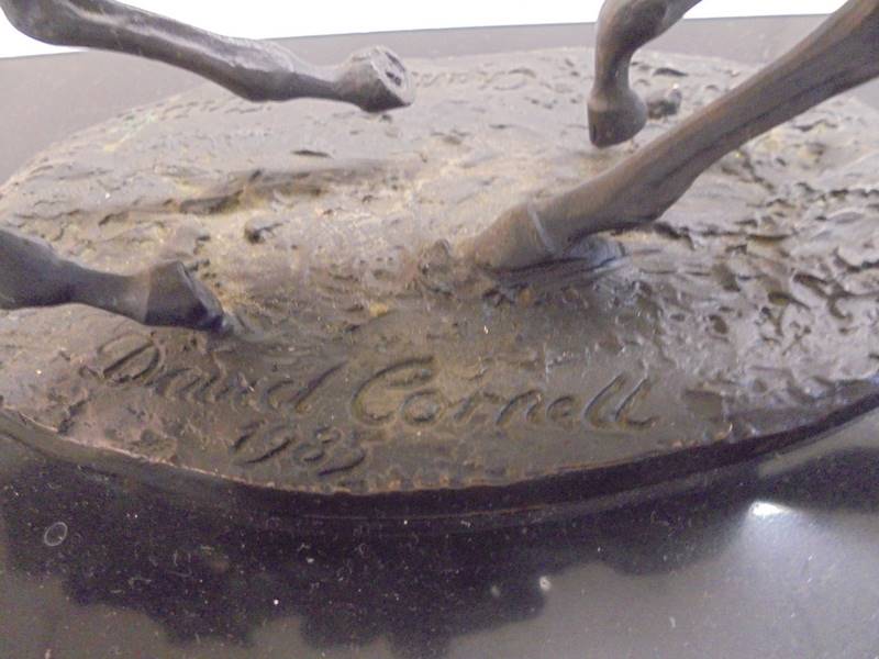 A signed bronze horse and jockey on a marble bases, signed David Cornell. - Image 4 of 4