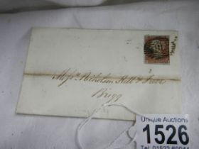 A 19th century penny red stamp on envelope dated 1847.