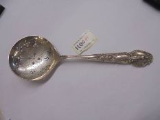 A Tiffany & Co., sterling silver PAT 1905 Renaissance pattern pea serving spoon, approximately 125g