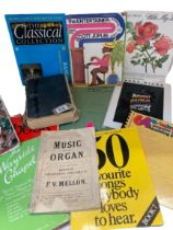 A box of vintage music books