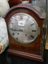 A late Victorian mahogany bracket clock in working orner.