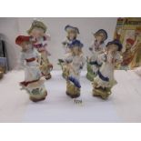 Six assorted ceramic figures.