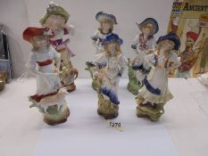 Six assorted ceramic figures.