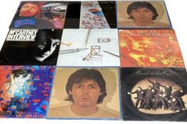 15 Fab Four solo albums. Vinyl mixed con, Covers used.