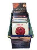 A Mixed box of LPs including Tomita, Santana, beatles etc