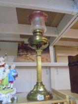 A brass Corinthian column oil lamp with Tulip shade, COLLECT ONLY.