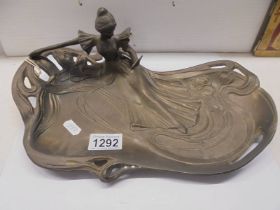 An Art Nouveau style bronze tray, 33 x 20 cm.