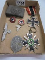 A WW2 German belt buckle, enamel badges including NSKK stick pin etc.,