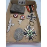 A WW2 German belt buckle, enamel badges including NSKK stick pin etc.,