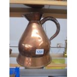 A large copper beer jug.