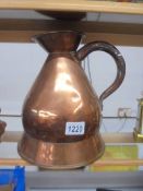 A large copper beer jug.