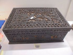 A good fretwork box featuring wild animal scenes, 29 x 26 x 13 m.