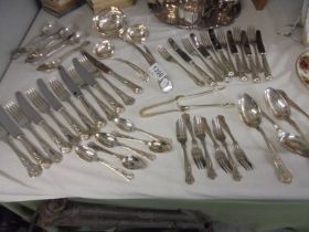 A quantity of King's pattern cutlery plus ladles and sugar nips.