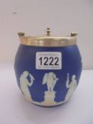 A Jasper ware biscuit barrel.