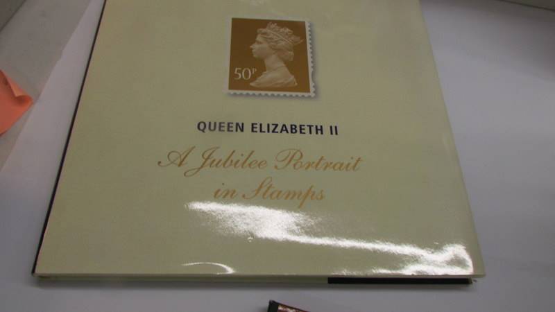 A 1987 Royal Mail stamp book, A Queen Elizabeth II Portrait in Stamps book & set of butterfly stamps - Image 6 of 8