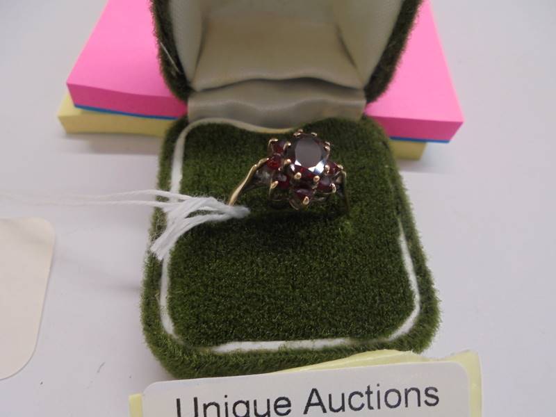 A 9ct gold ring set garnets, size J half, 2.2 grams. - Image 2 of 4