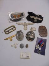 A tray of WW2 German style badges and patches.