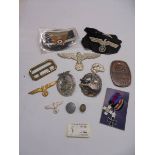 A tray of WW2 German style badges and patches.