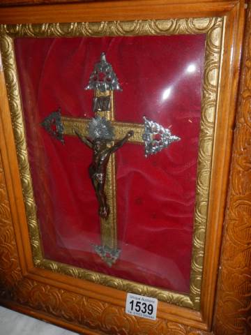 An early 20th century framed and glazed crucifix with domed glass. - Image 2 of 2