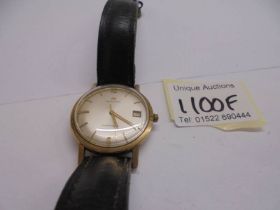 A Hamilton automatic date watch.