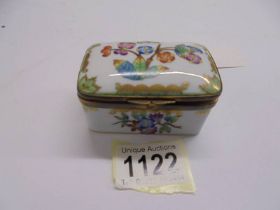 An early 20th century Hungarian porcelain hand painted pill box.